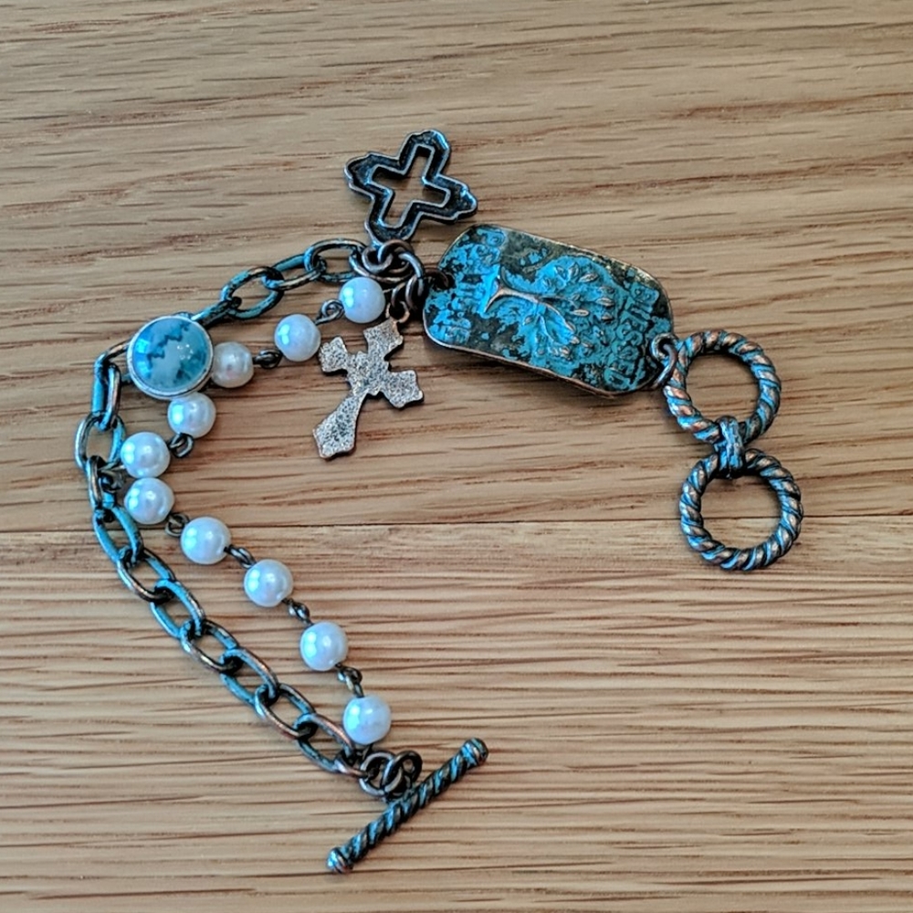 Patina double strand cross toggle bracelet